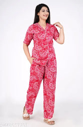 Women's printed rayon night suit top and pajama set, short-sleeved print design on display rack
